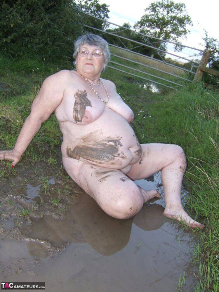 Fat nan Grandma Libby steps into a puddle before covering herself in mud - #6