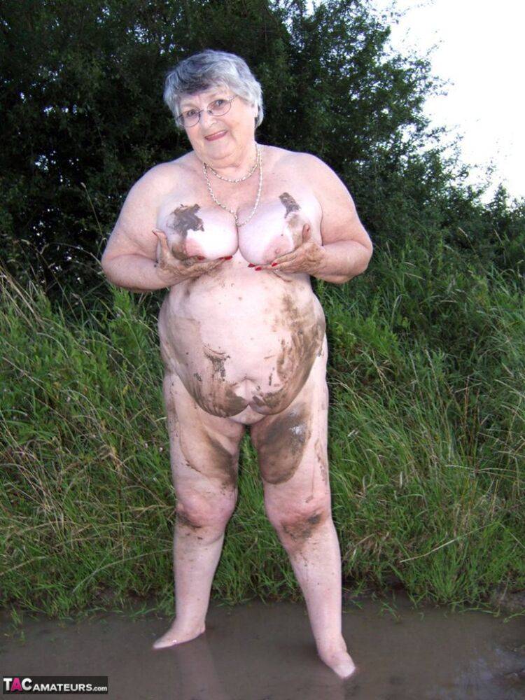 Fat nan Grandma Libby steps into a puddle before covering herself in mud - #7