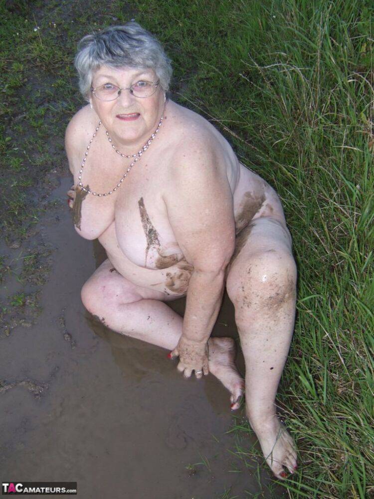 Fat nan Grandma Libby steps into a puddle before covering herself in mud - #14