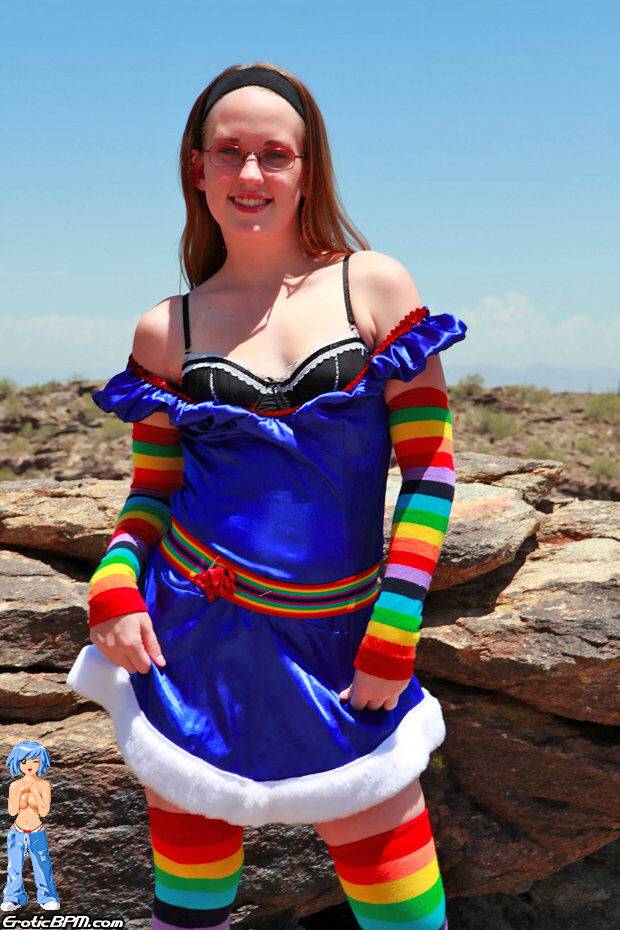 White teen Bunny strips to multi-colored arm and legs socks on an outcrop - #9