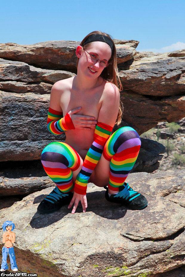 White teen Bunny strips to multi-colored arm and legs socks on an outcrop - #11