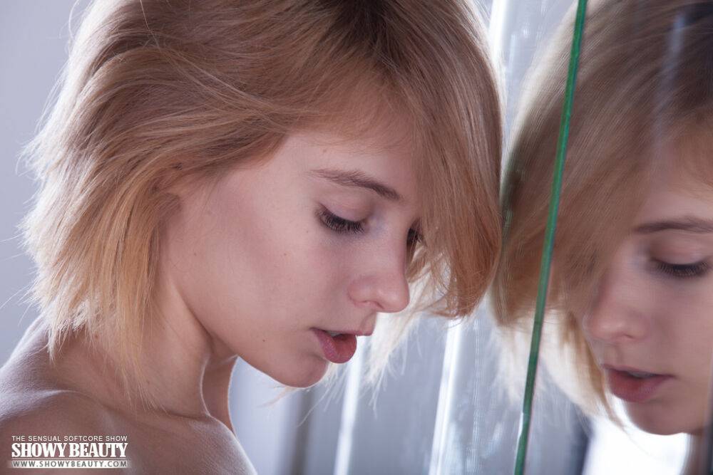 Young blonde Lilu hits upon tempting poses in white over the knee socks - #1