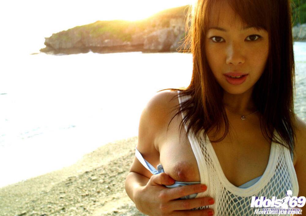 Slender Asian babe Hikari outdoors dressed in a skimpy white nighty - #4