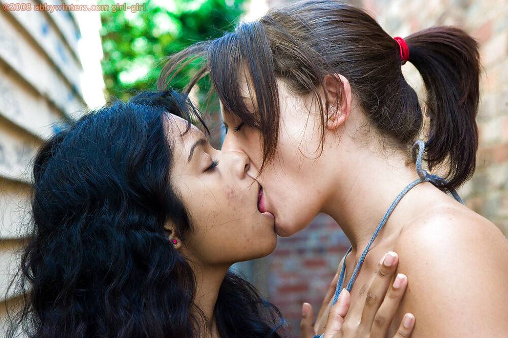 Indian lesbian Kiki tongue kissing white girlfriend Lou-Ellyn outdoors - #15