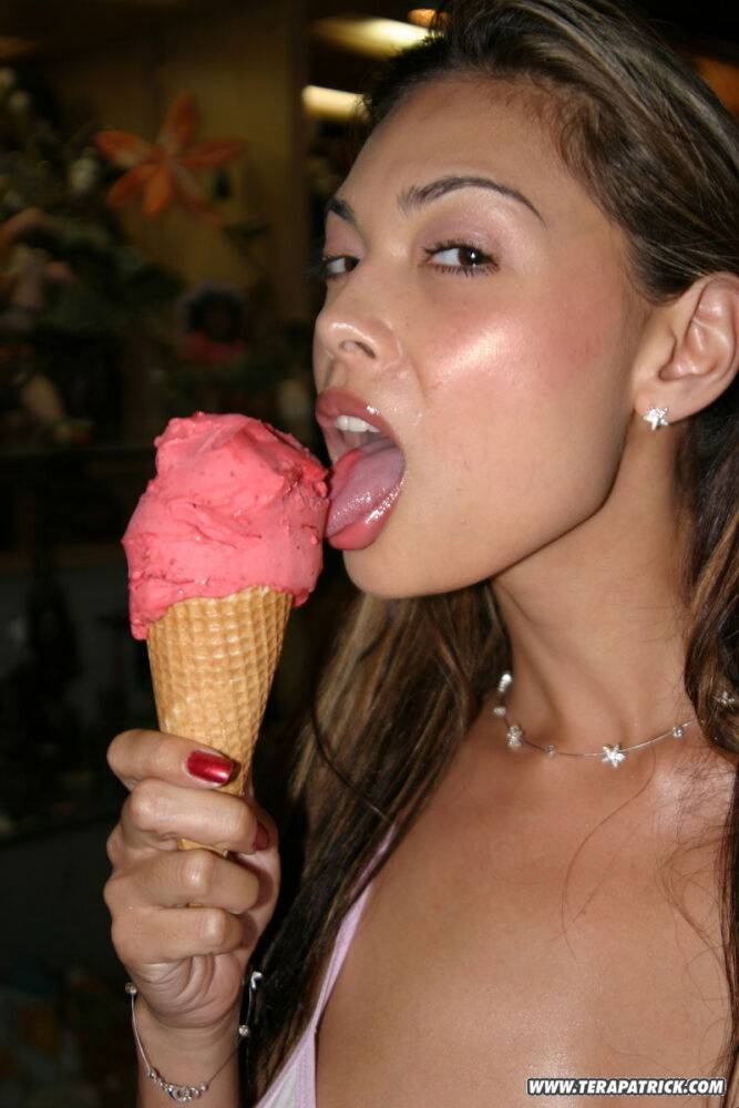 Asian model Tera Patrick licks ice cream cone in white latex boots - #8