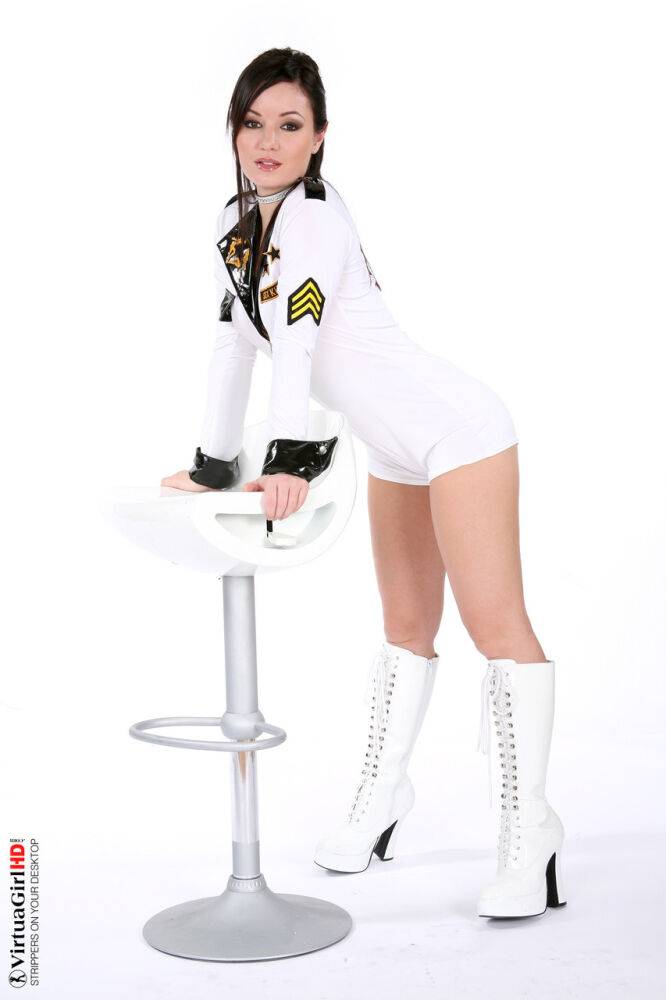 Beautiful girl Tereza removes her uniform to get naked in white go go boots - #1