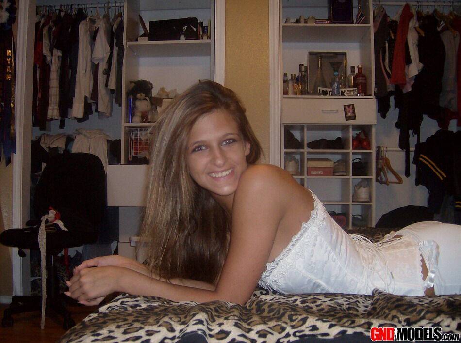 Teen in white corset and tight panties showing off her perfect tight body - #4