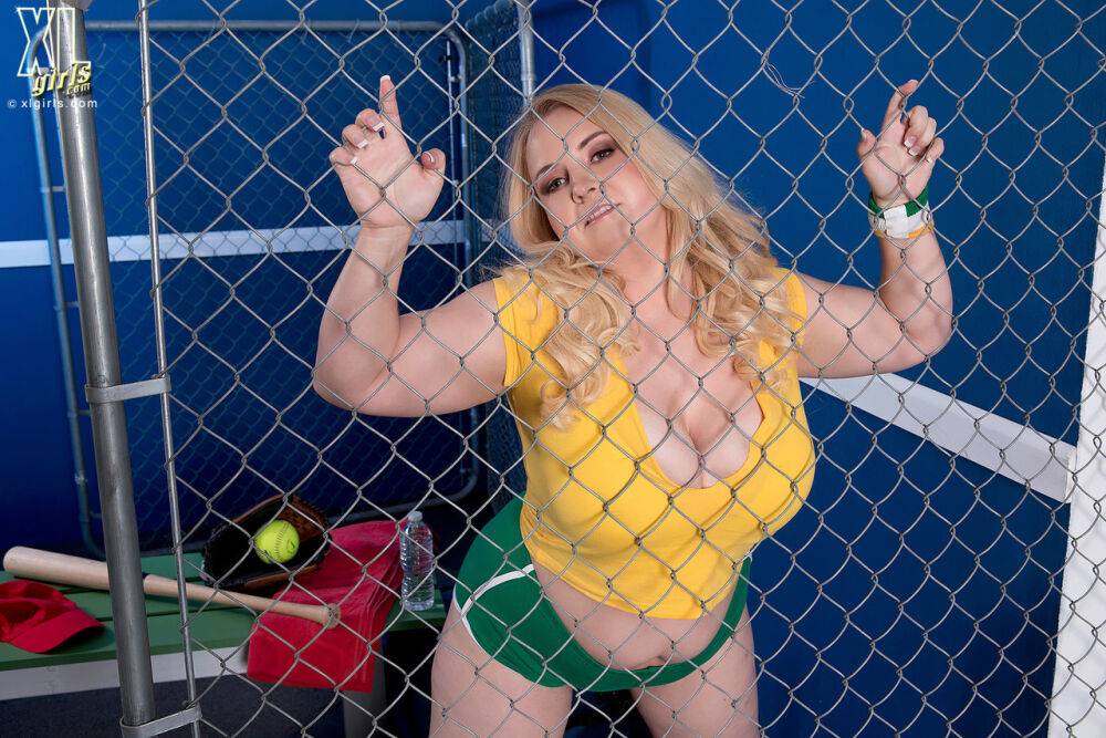 Blonde BBW Nikky Wilder strips to white socks and shoes in a batting cage - #8