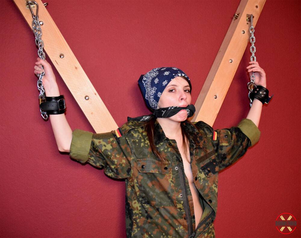 White girl exposes her breasts while cleave gagged and chained in camo - #3