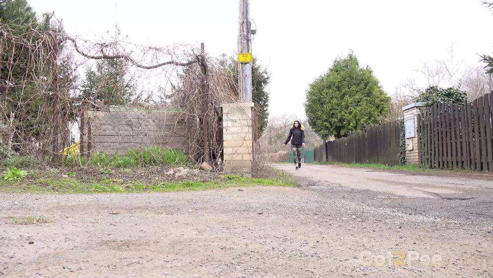 White girl Victoria Daniels takes a piss next to a pole beside a road - #7