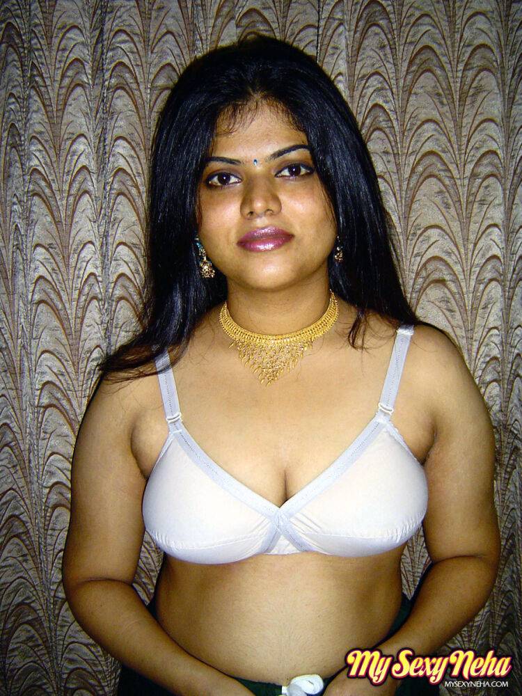 Chubby Indian girl Neha Nair lets her boobs spill forth from white bra - #2