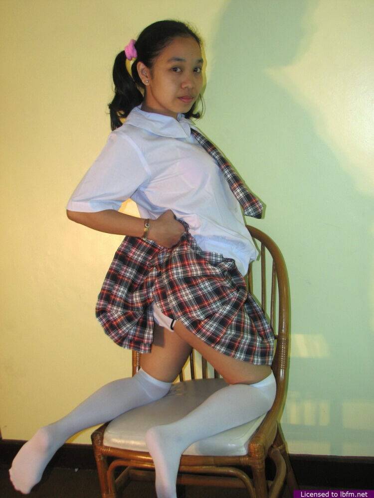 Asian schoolgirl Maryjane reveals her bald pussy in white over the knee socks - #3