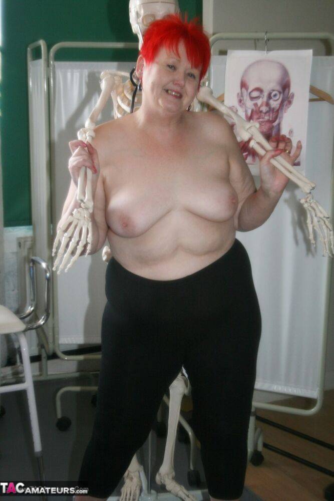 Slutty mature nurse in white stockings gets toyed up by a skeleton - #2