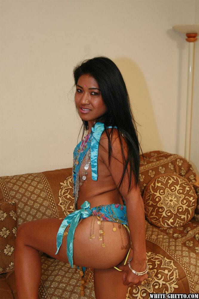 Fully clothed Indian girl flashes her sexy tight ass in yellow thong panties - #1