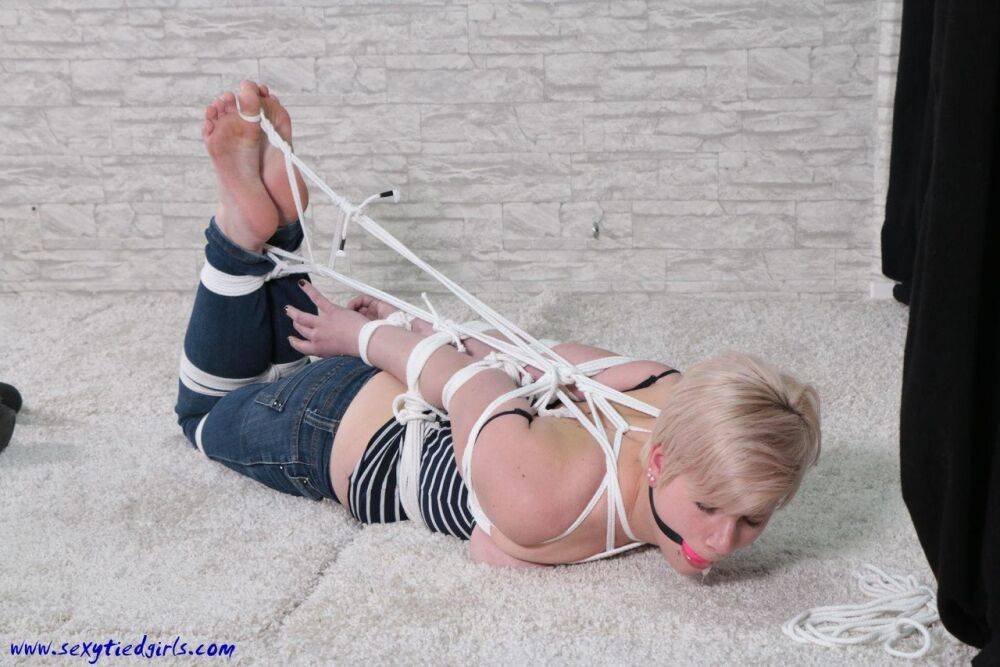 White girl with pretty feet struggles against ball gag and rope bindings - #11