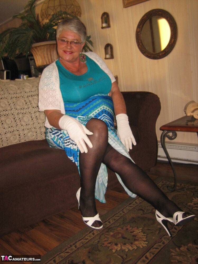 Fat Oma Girdle Goddess wears white gloves while disrobing to a bra and girdle - #3