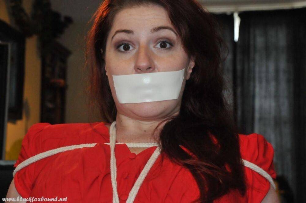 White girl is silenced with medical tape while tied up in her clothing - #12