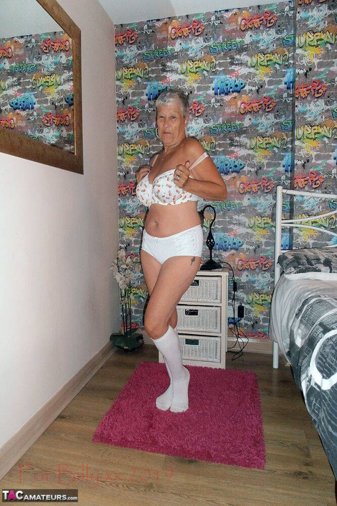 Silver haired granny Savana strips down to white knee socks in her bedroom - #11