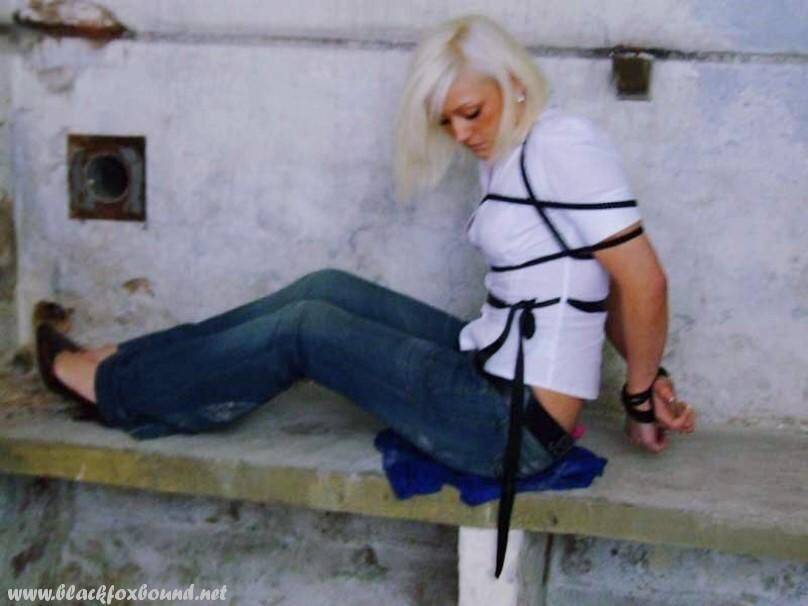 British woman is tied up and gagged in blue jeans and a white shirt - #9