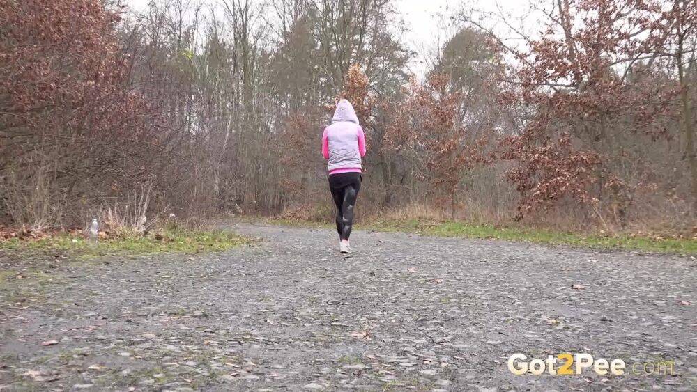 White girl Lara Fox takes a piss while out for a walk on a chilly day - #3