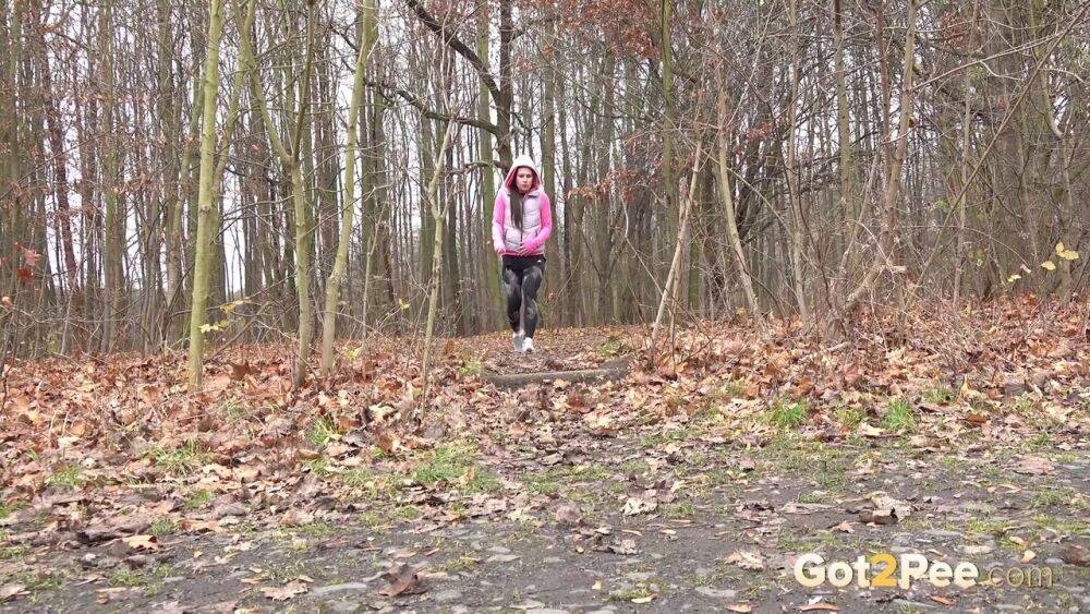 White girl Lara Fox takes a piss while out for a walk on a chilly day - #8