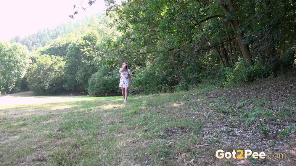 White girl Nikki Dream takes a piss in a field while out for a walk - #12