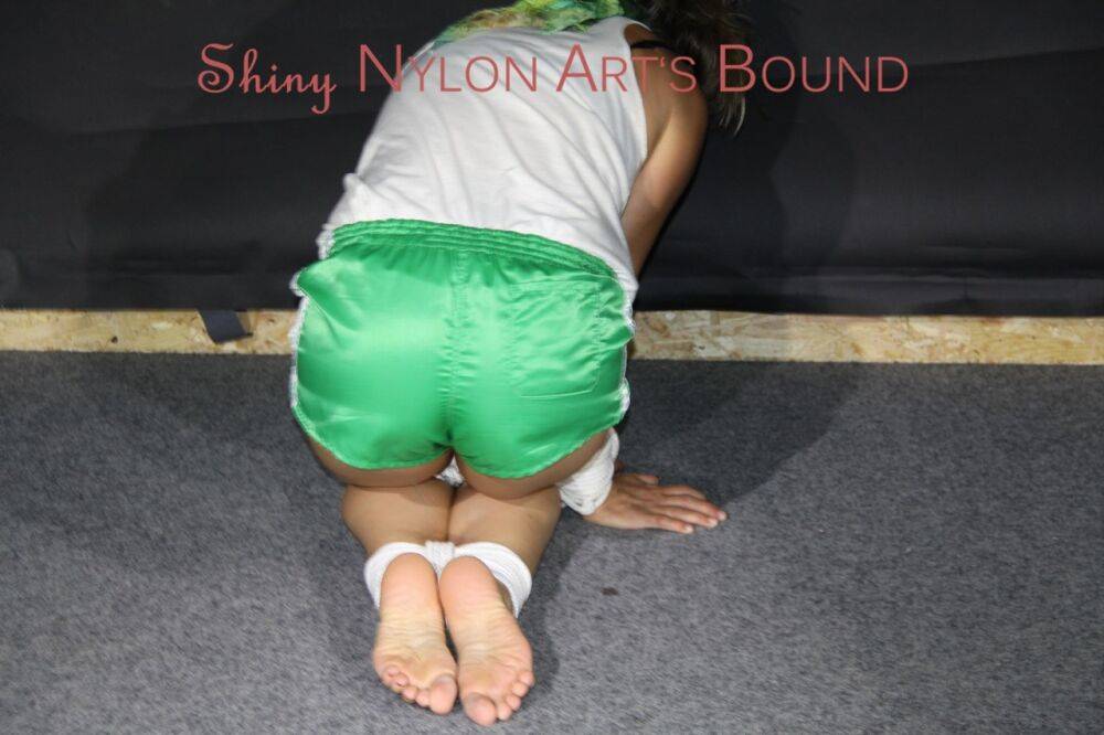 Watching sexy Sandra wearing a sexy green shorts and a white top being tied - #7