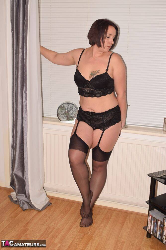 Older woman in three piece black lingerie and nylons exposes her small boobs - #8