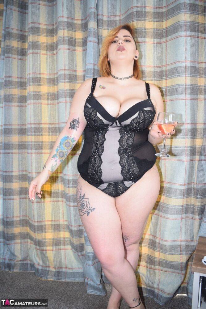 Tattooed BBW smokes and drinks while peeling off her lingerie - #15