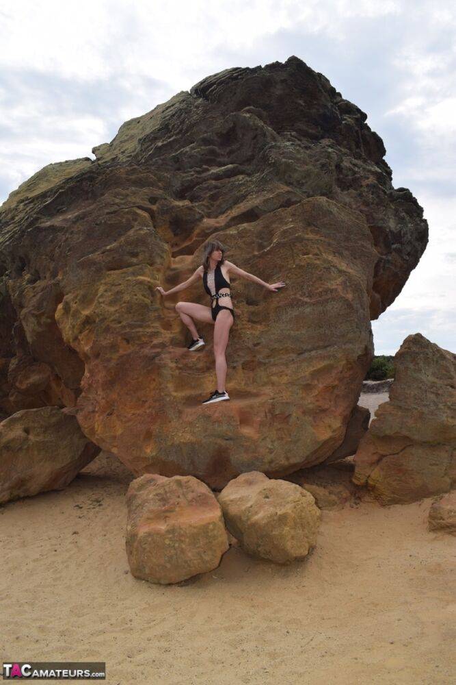 Amateur model gets naked in high-heeled footwear on iron ladened rocks - #4