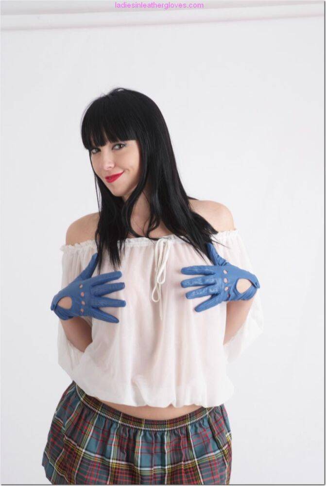 Dark haired girl Sammi Jo exposes her nice tits in leather gloves and a skirt - #15