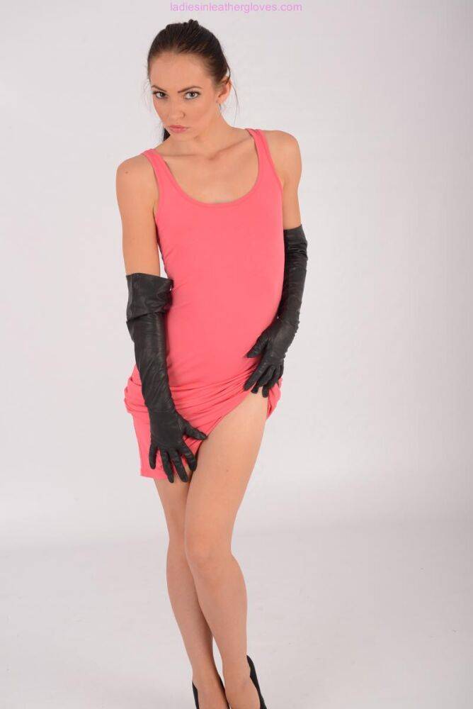 Solo model Cath sports long leather gloves while modelling in a dress - #5