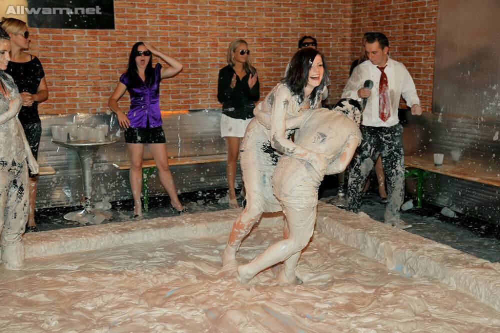 Stunning fetish ladies have some fully clothed mud wrestling fun - #13