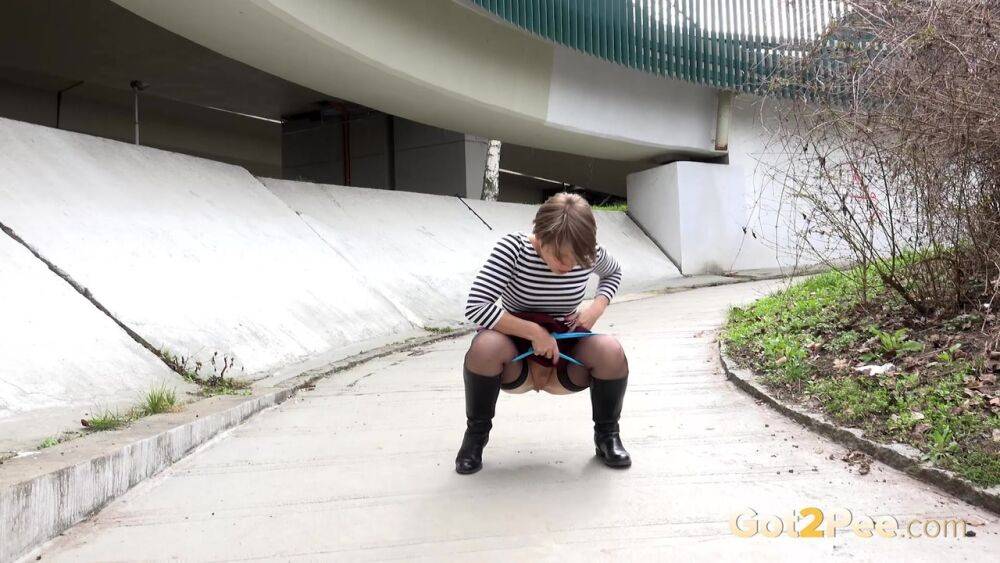 Short haired bitch Shila pulls her sexy panties down in public & takes a piss - #10