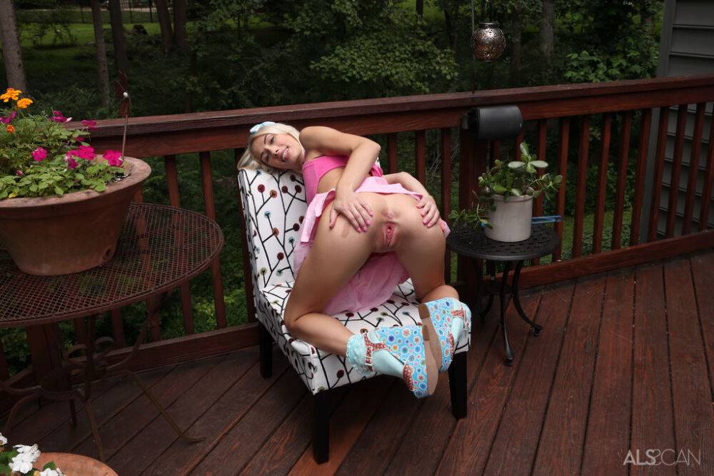 Thin blonde Sky Pierce attaches clamps to her wide open pussy on a deck - #14