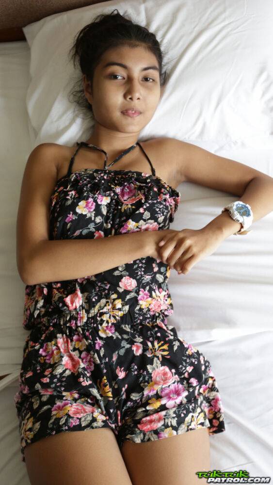 Petite Asian teen Pauw takes off her gown and flaunts her tits and hairy kitty - #5