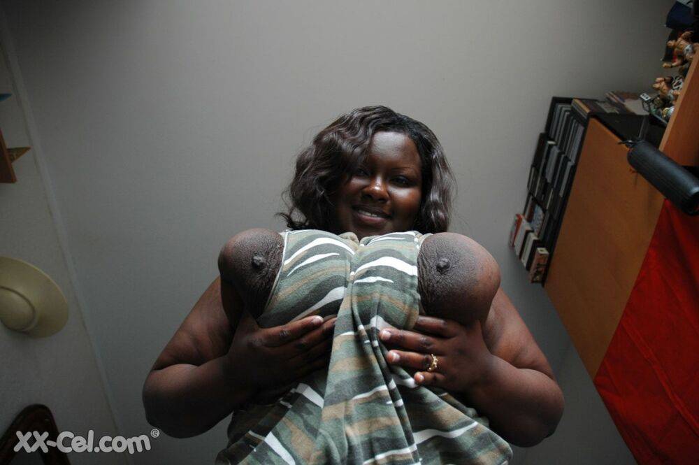 Fat black woman Mariana Kodjo showing off her extra-large natural tits - #4