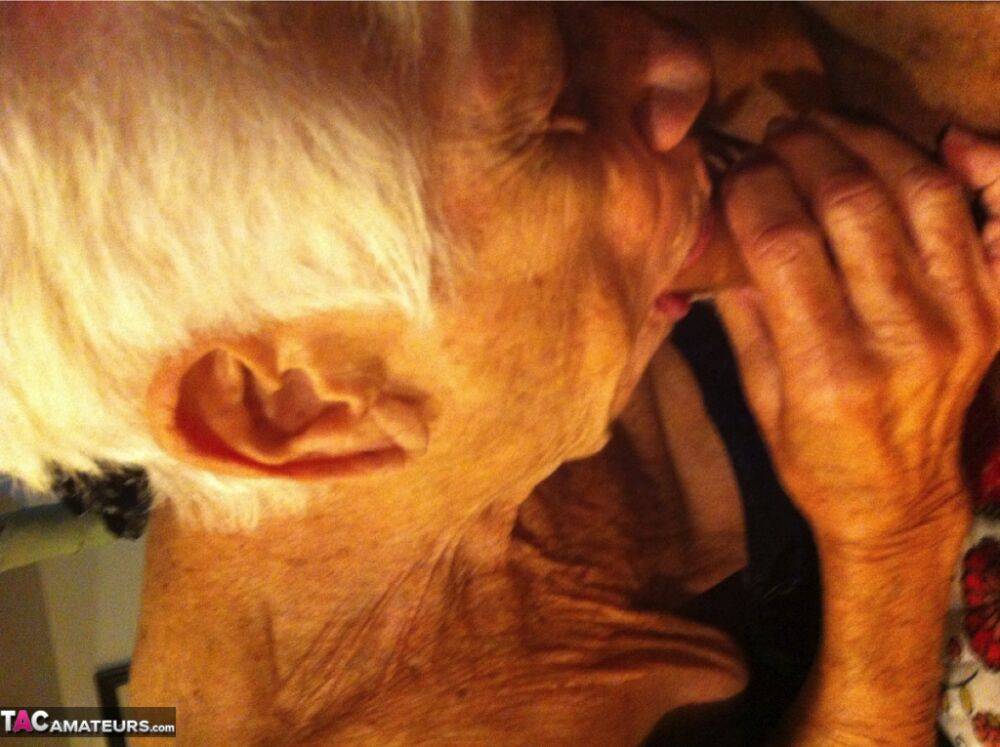 Really old granny shows off her cock sucking skills from a POV perspective | Photo: 3885910