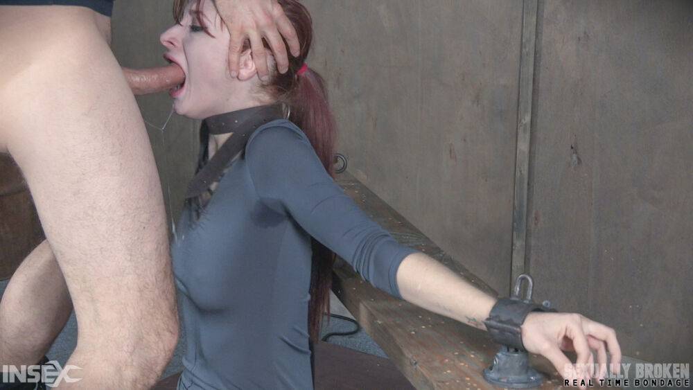 Pale redhead Violet Monroe undergoes a rough throat fucking in dungeon - #7