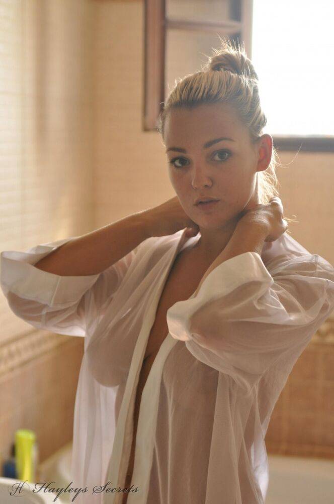 Beautiful blonde chick Jodie Gasson pulls on a see thru blouse in the morning - #12