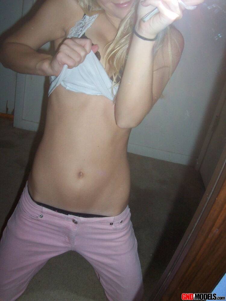 Blonde amateur Kylie takes mirror selfies while disrobing to her bra and thong - #4