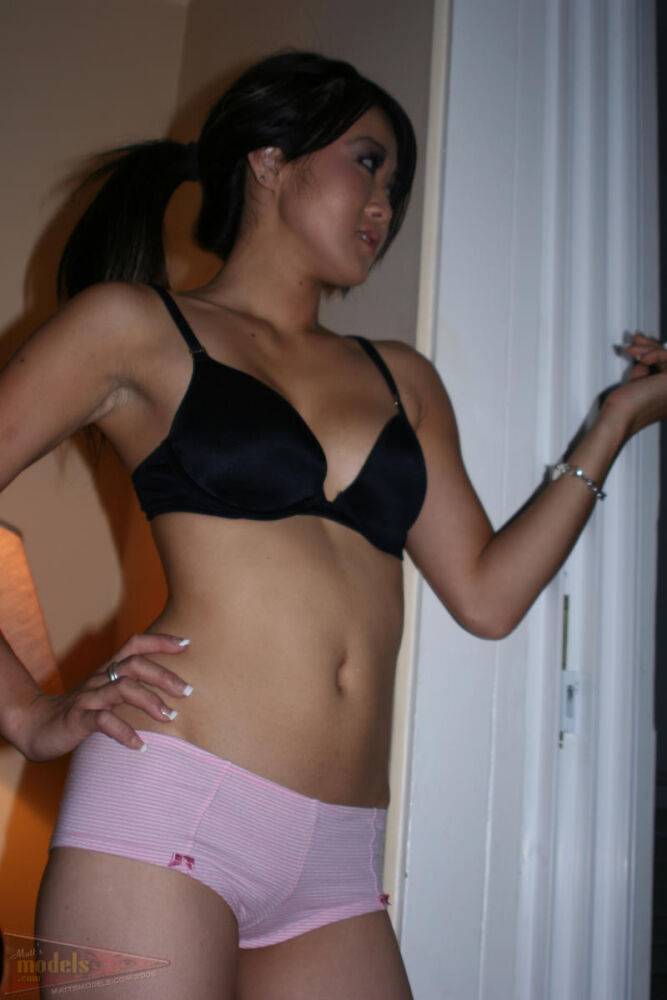 Asian first timer Taya pauses for a smoke break in her bra and panties - #14