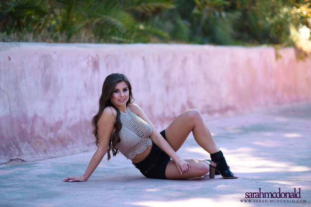 Glamorous shorts clad Sarah Mcdonald bares her big tatas in the tropical sun - #9