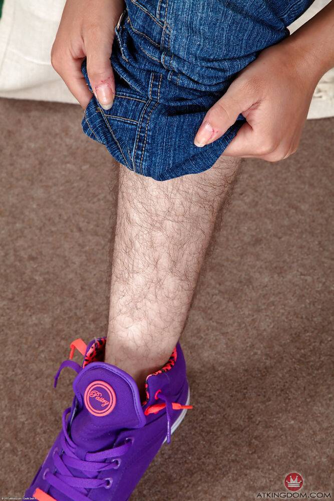 Tattooed hirsute woman shedding jeans to show off hairy legs and beaver - #2