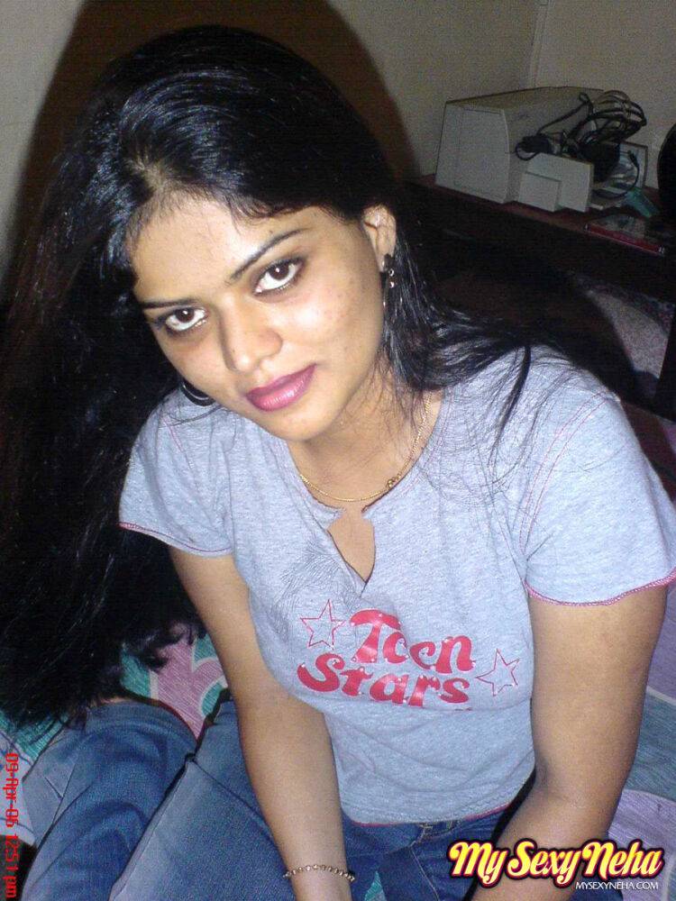 Petite Indian girl uncups big naturals after removing blue jeans - #4