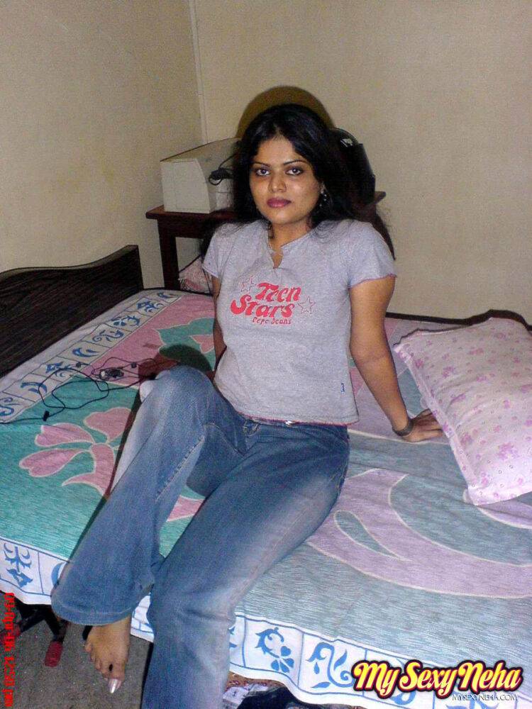 Petite Indian girl uncups big naturals after removing blue jeans - #9