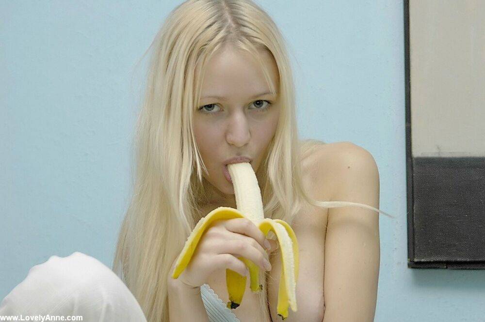 Innocent Anne eating a big banana naked - #8