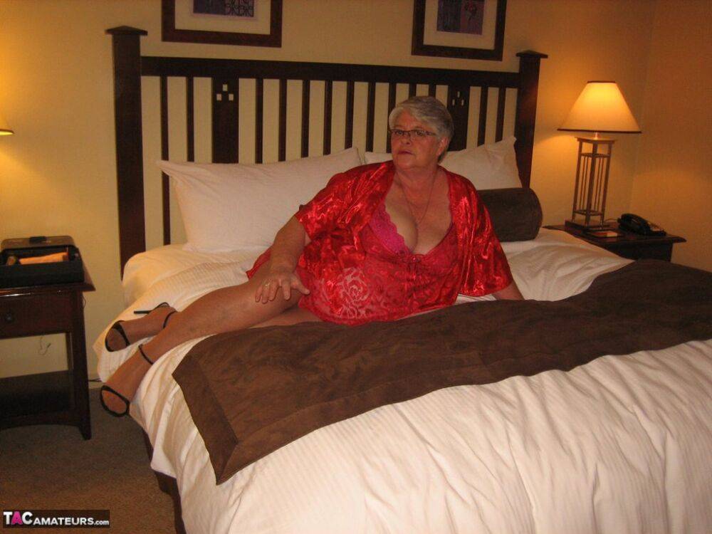 Fat granny Girdle Goddess whips out her big boobs on a bed in pantyhose - #13