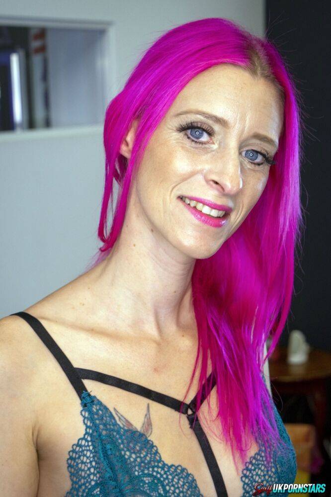 Skinny female Roxy Lace sports pink hair while modelling lingerie - #4