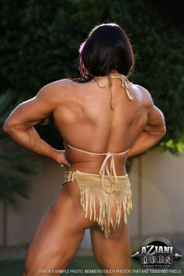 Bodybuilder Angela Salvagno flexes her muscles in Native American clothing - #10